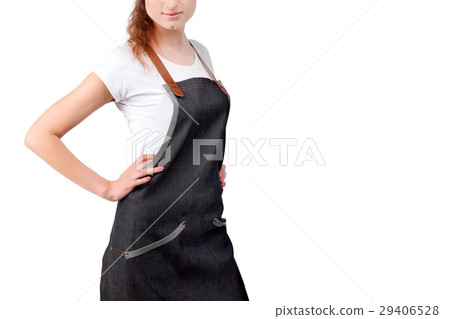 Young redhaired woman chef or waiter posing Young redhaired woman chef or waiter posing 29406528