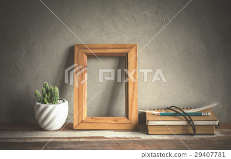 mock up blank photo frame with cactus flower mock up blank photo frame with cactus flower 29407781