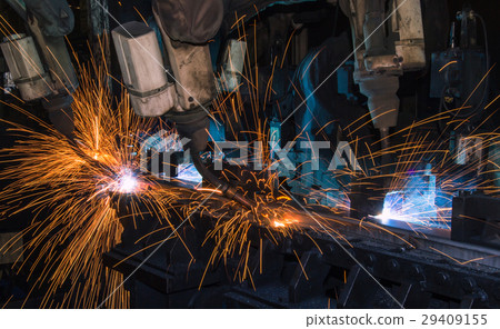 Team robot are welding in factory 29409155