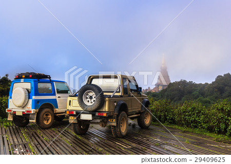 Team Off Road cars in car park top of mountain Team Off Road cars in car park top of mountain 29409625