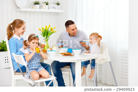 Happy family  at breakfast 29409923