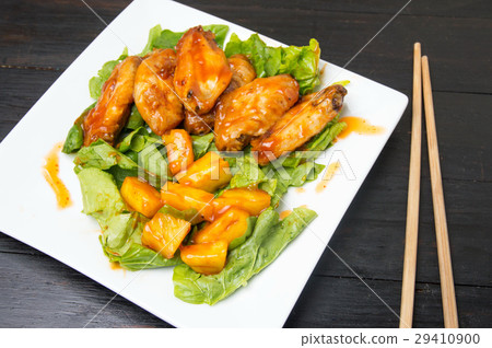 Pineapple chicken wings with barbecue and sauce Pineapple chicken wings with barbecue and sauce 29410900