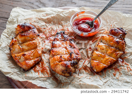Grilled chicken breasts in hot mango sauce Grilled chicken breasts in hot mango sauce 29411742