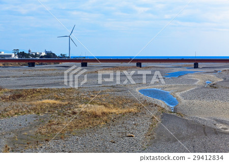 The Minami Akitagawa bridge over the Abe River and windmill The Minami Akitagawa bridge over the Abe River and windmill 29412834