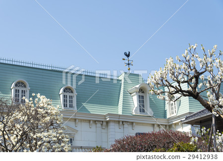 A Western-style house with a weatherfall on the roof A Western-style house with a weatherfall on the roof 29412938