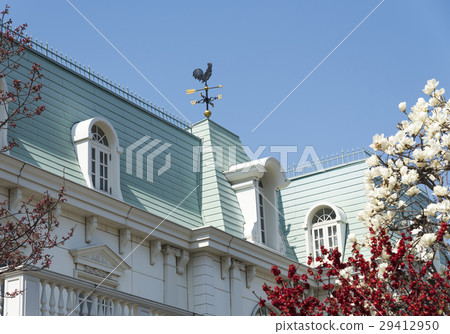 A Western-style house with a weatherfall on the roof A Western-style house with a weatherfall on the roof 29412950