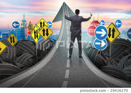 Businessman in uncertainty concept on road Businessman in uncertainty concept on road 29416270
