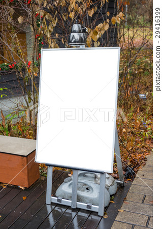 Blank menu board on sidewalk with space for text 29416399