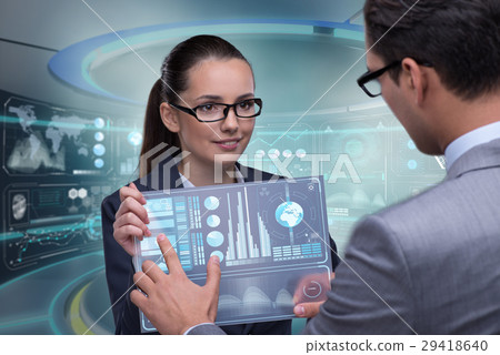 Two businesspeople discussing business results 29418640