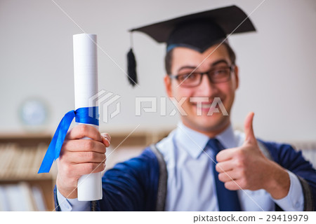 Young man graduating from university Young man graduating from university 29419979
