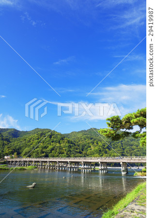 Arashiyama Togetsukyo Bridge and the flow of the Hozu River (Katsura River) in late summer Arashiyama Togetsukyo Bridge and the flow of the Hozu River (Katsura River) in late summer 29419987