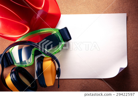 Helmet, earphones, goggles and blank paper Helmet, earphones, goggles and blank paper 29422597