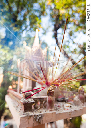 Offerings to gods in  temple with aroma sticks 29425848