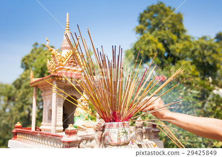 Offerings to gods in  temple with aroma sticks 29425849
