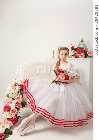 Cute ballerina holding flowers Cute ballerina holding flowers 29429893