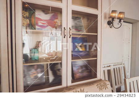 Cupboard with glass doors. 29434823