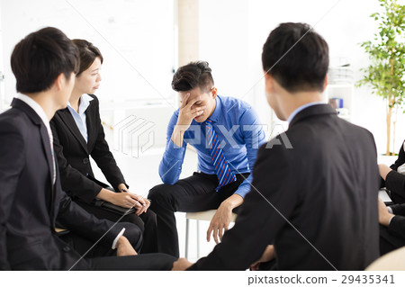 sad and depressed business man during meeting sad and depressed business man during meeting 29435341