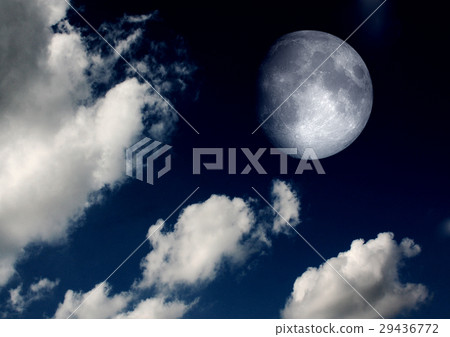 The moon in the night sky in clouds 29436772