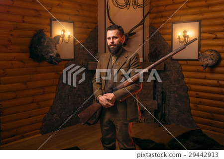 Vintage hunter man in traditional hunting clothing Vintage hunter man in traditional hunting clothing 29442913