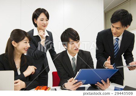 A businessman presenting businessman business team A businessman presenting businessman business team 29443509