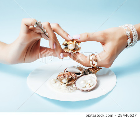 beautiful woman hands with pink manicure holding beautiful woman hands with pink manicure holding 29446627