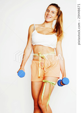 young pretty slim blond woman with dumbbell 29446671