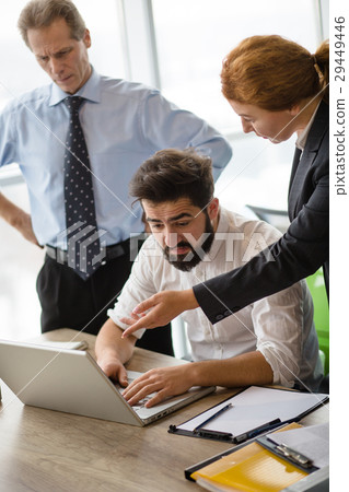 Angry boss screaming at workers Angry boss screaming at workers 29449446
