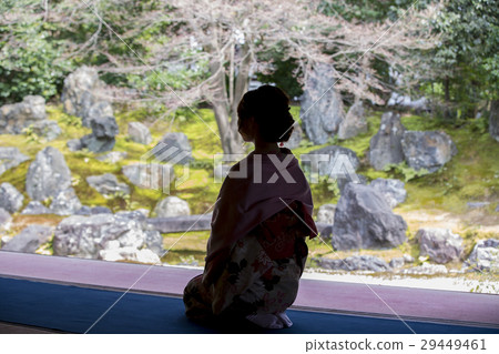 Kimono-shi Kyoto-shi, Higashiyama-ku, Kimono-ku woman in kimono looking at the garden seated from the temple's room around Gion-cho Kimono-shi Kyoto-shi, Higashiyama-ku, Kimono-ku woman in kimono looking at the garden seated from the temple's room around Gion-cho 29449461