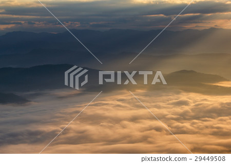 Layer of mountains in the mist at sunrise time 29449508