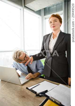 Angry boss screaming at workers Angry boss screaming at workers 29449520