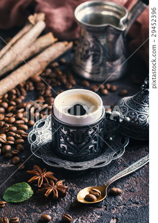 Turkish coffee in metal cup Turkish coffee in metal cup 29452396