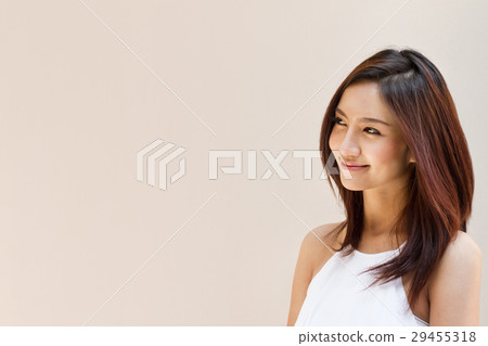 smiling happy woman looking at blank background 29455318