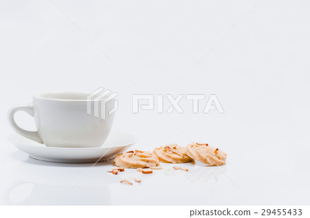 Empty coffee cup and cookies on white background Empty coffee cup and cookies on white background 29455433
