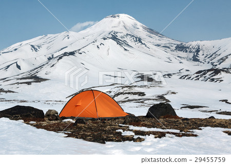Orange camping tent at foot of volcano Orange camping tent at foot of volcano 29455759
