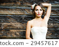 Beautiful Bride on Wooden Background 29457617