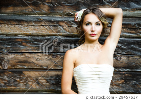 Beautiful Bride on Wooden Background 29457617