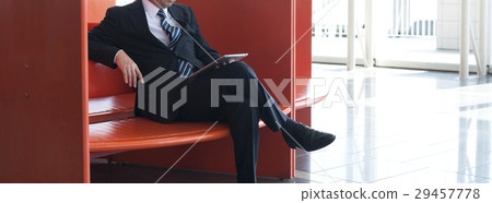 Parts cut of businessmen who operate tablet in lounge Parts cut of businessmen who operate tablet in lounge 29457778