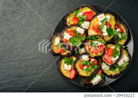 Grilled eggplants with garlic,feta cheese,tomatoes Grilled eggplants with garlic,feta cheese,tomatoes 29458221