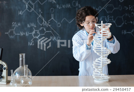 Smart pupil enjoying chemistry class at school 29458457