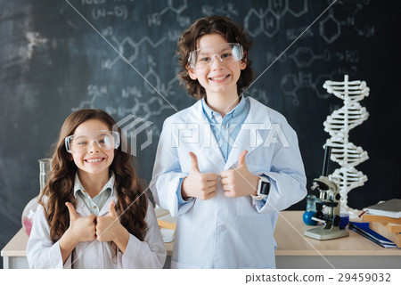 Cheerful little researchers enjoying science class 29459032