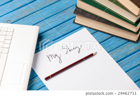 photo of pencil, books, laptop and paper 29462711