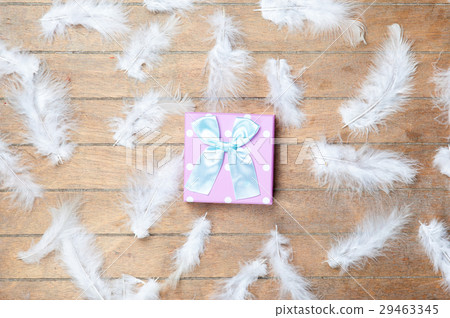 photo of cute gifts near bird feathers photo of cute gifts near bird feathers 29463345