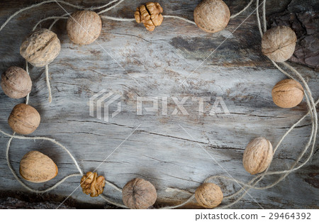 Walnuts on aged wood. Closeup Walnuts on aged wood. Closeup 29464392