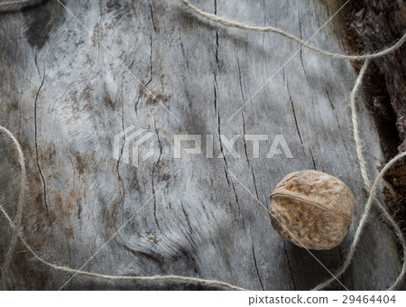 Walnuts on aged wood. Closeup Walnuts on aged wood. Closeup 29464404