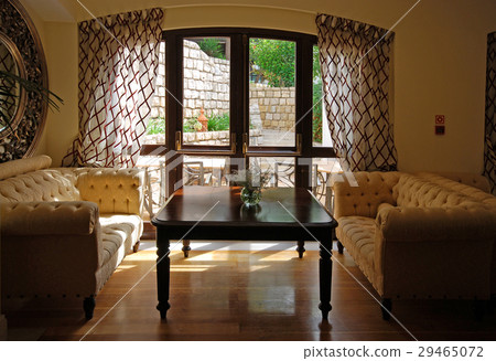 cozy interior with furniture, mirror and window 29465072