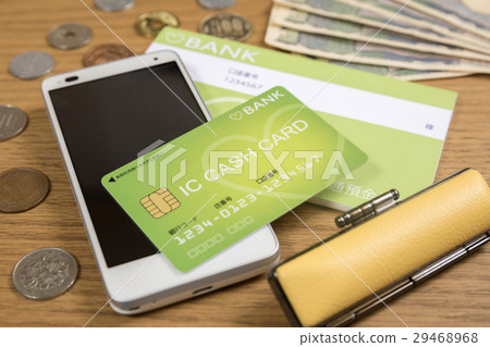 Cash card and passbook, seal, cash and smartphone Cash card and passbook, seal, cash and smartphone 29468968