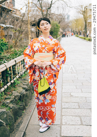 Kimono women walking in the Gion city 29475711