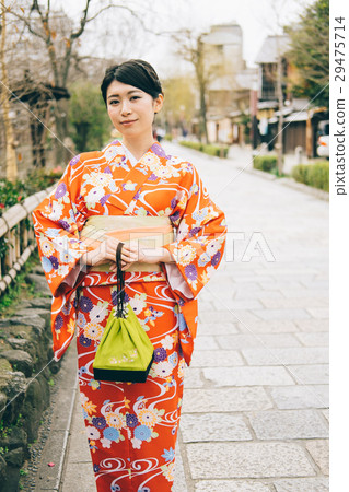 Kimono women walking in the Gion city 29475714