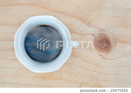 Cup of coffee and reflection of sky Cup of coffee and reflection of sky 29475950
