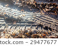 tyre tracks on a muddy road in lake district uk 29477677